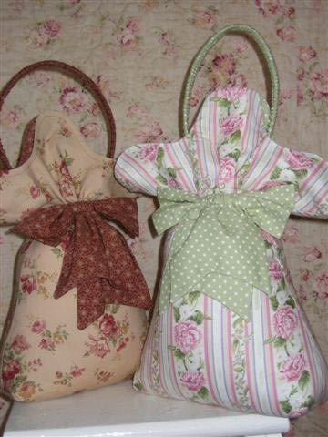 Two Aunt Milly doorstops in alternative colours. Using floral and stripe fabric that creates an old world look. 